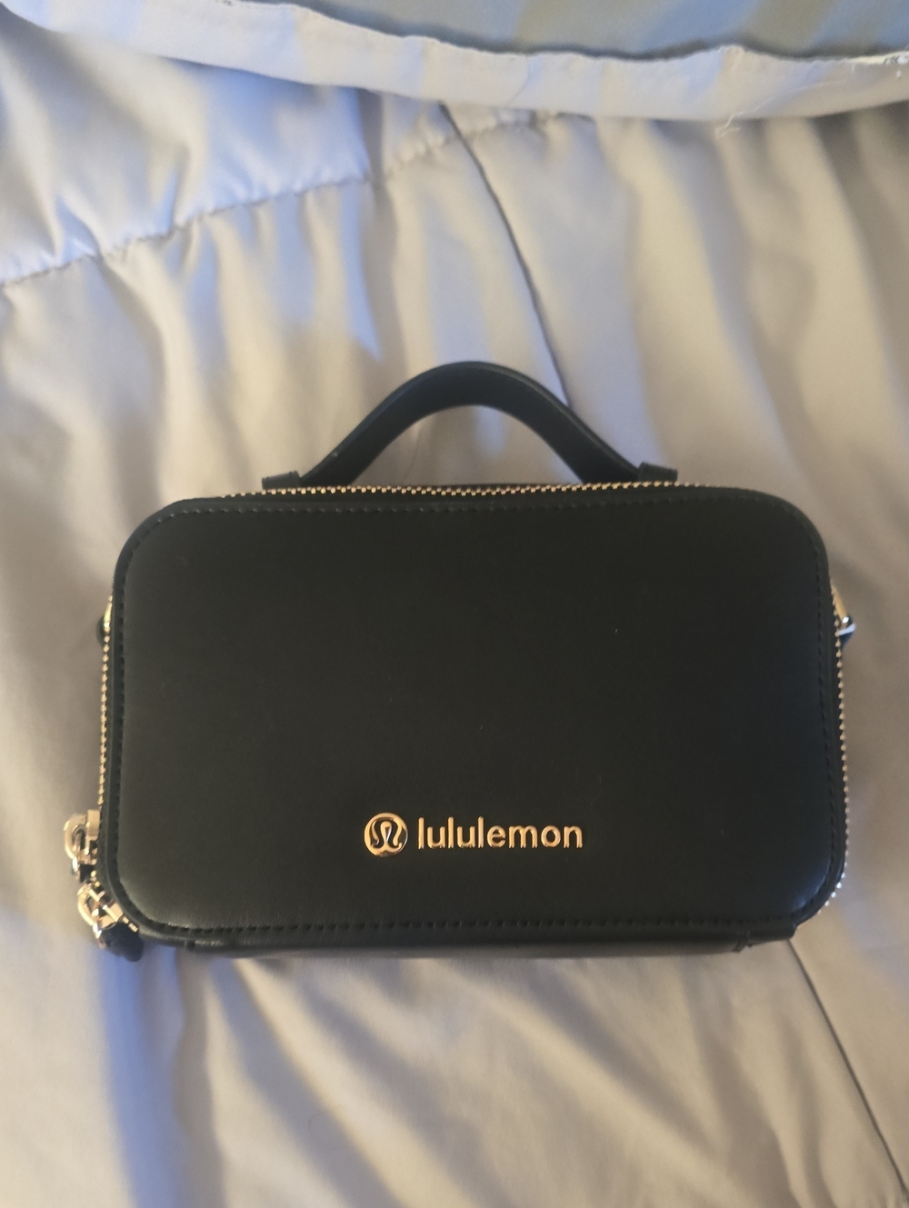 lululemon Leather Alternative Camera Crossbody bag with gold logo